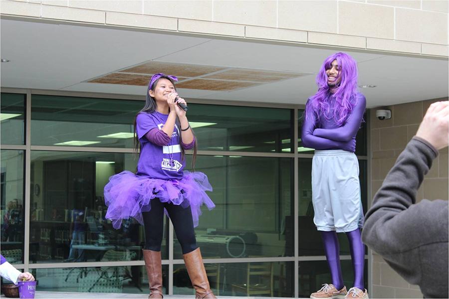 Senior Nimol Chea presented senior Hatim Tai with a $25 gift card for being the most purpled out person. 