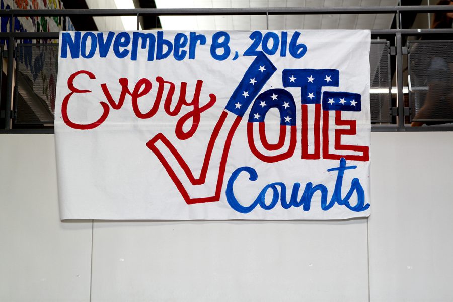 A reminder that every vote counts is displayed on a sign on Main Street. 