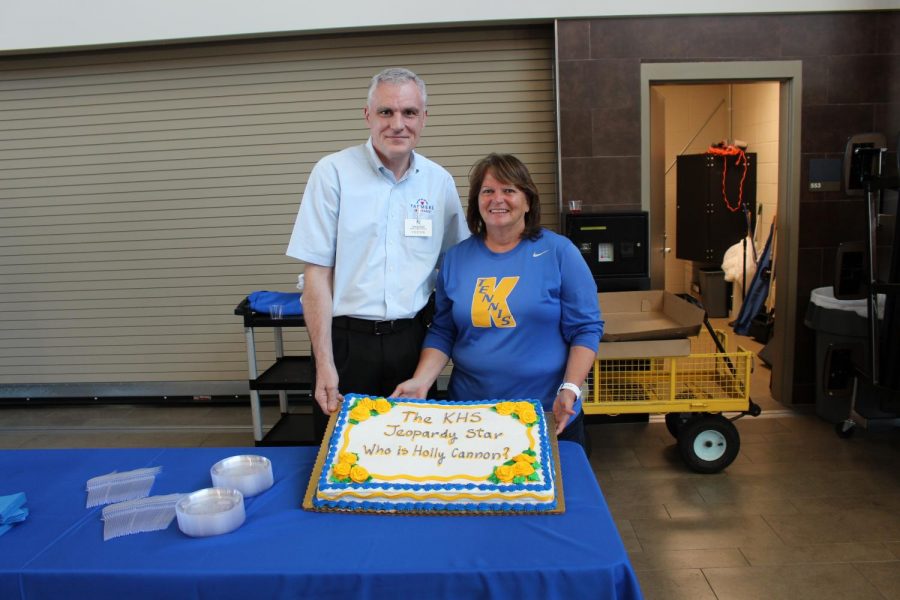 Holly Cannon receives a cake from Farmers Insurance during her watch party in May.