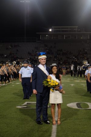 Seniors Andrew Hebert and Andreana DeGuzman pose after being crowned Homecoming King and Queen
