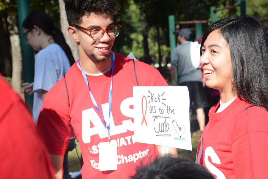 Students volunteer at the ALS walk in the Woodlands Saturday morning as part of Klein Serves. 