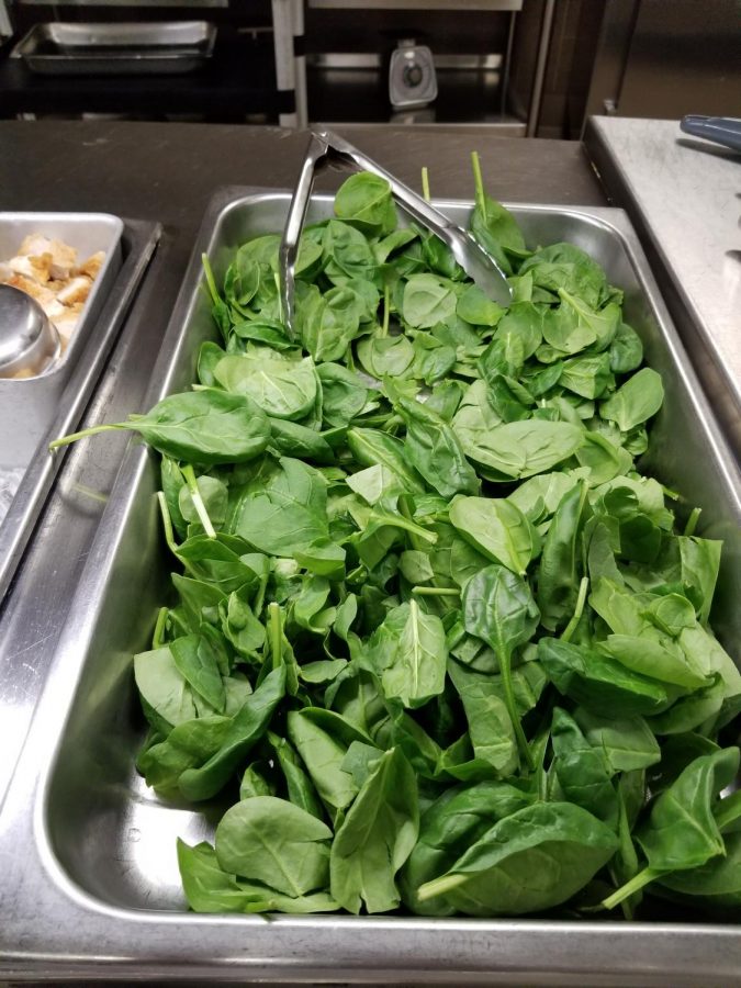 The cafeteria now only serves spinach because of the recent recall of romaine lettuce. 