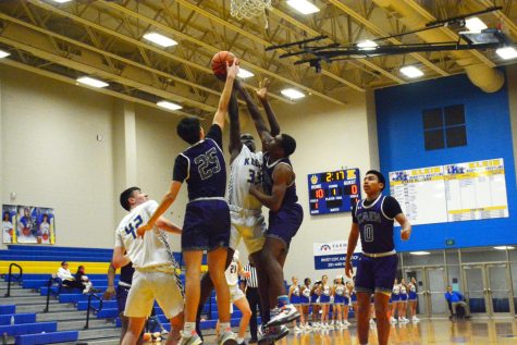 The varsity basketball team plays against Klein Cain and brings home a win.