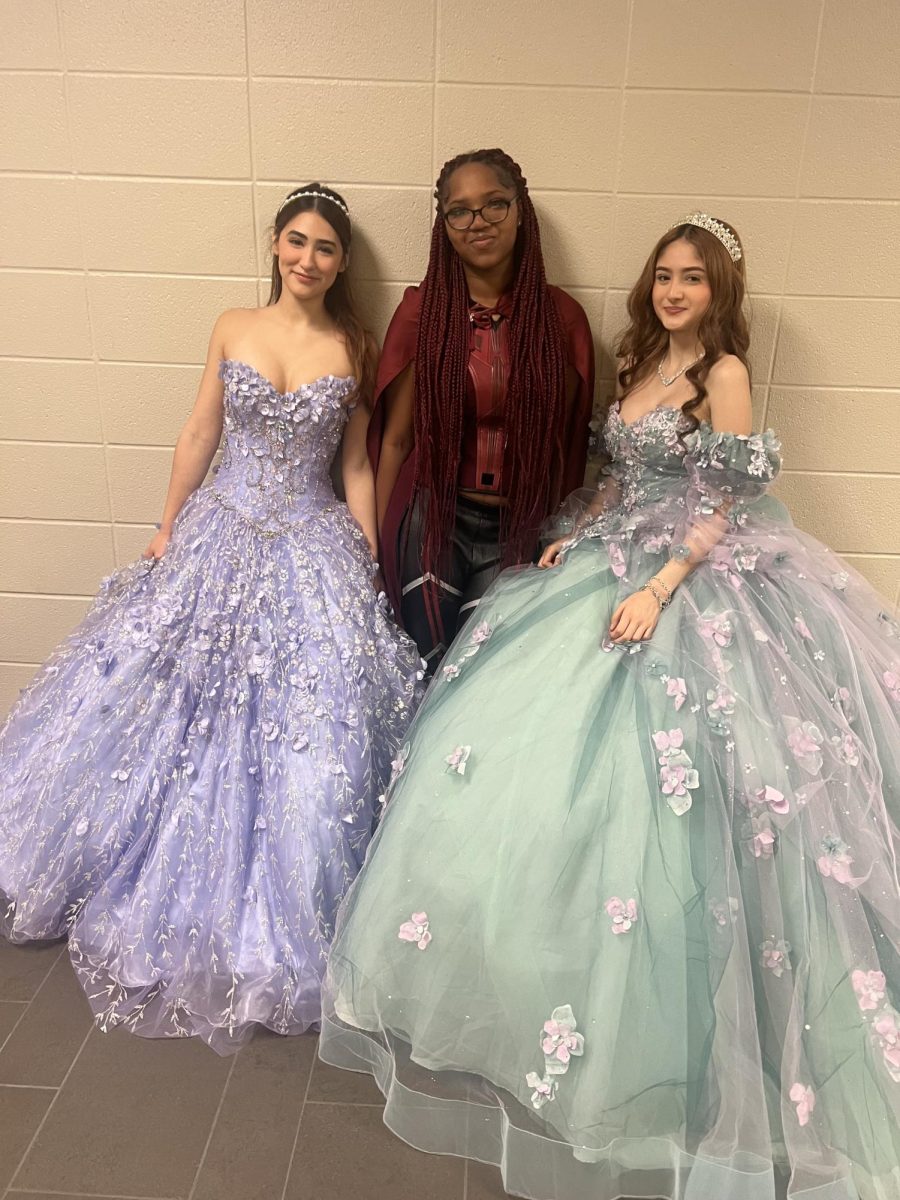 Cosmetology students pose in their costumes