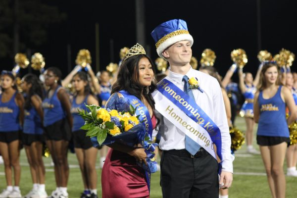 Seniors Matthew Moland and April Lara are crowned Homecoming King and Queen. 